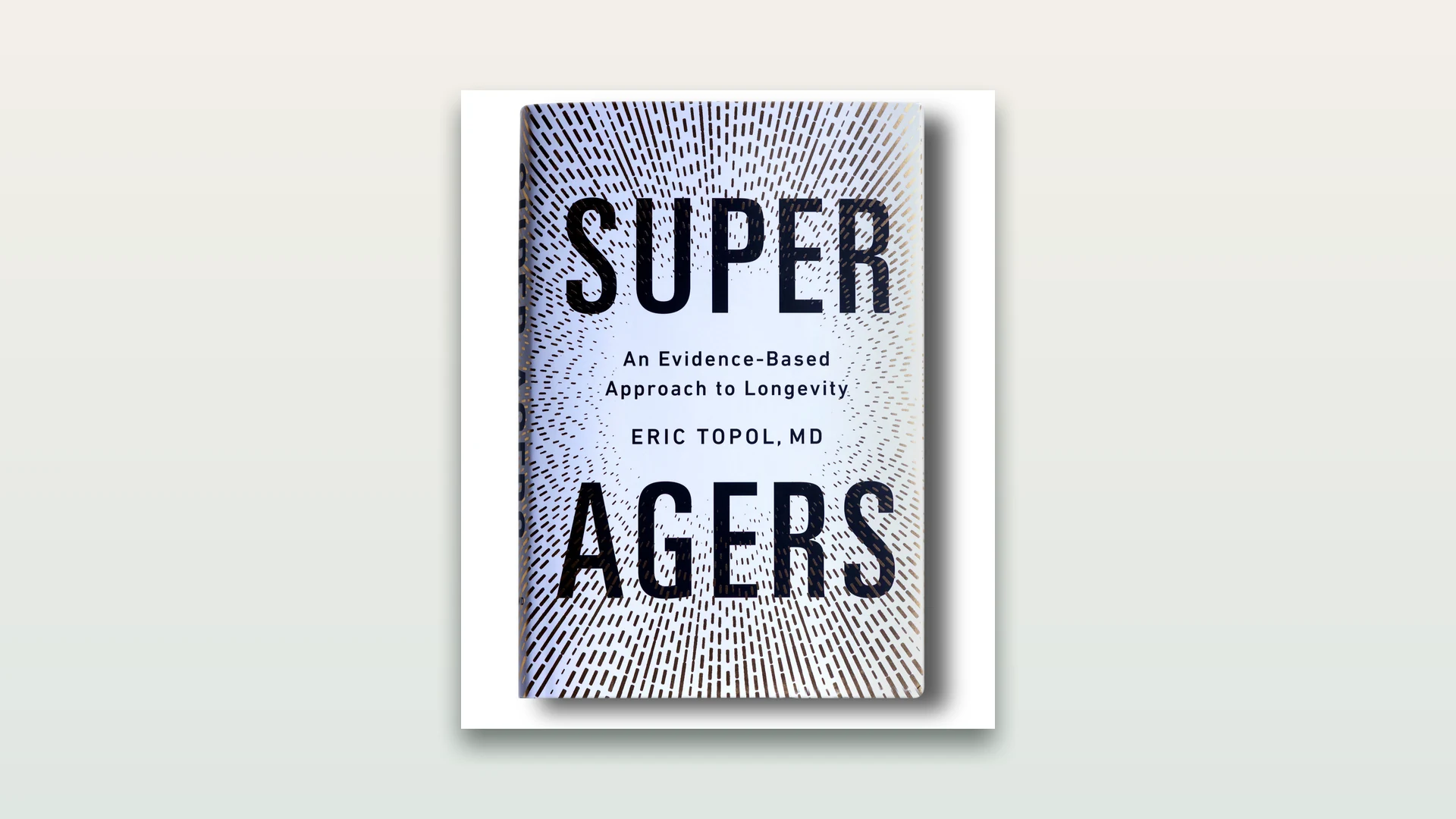 Cover of the book Super Agers by Eric Topol, black lettering on a white and gold background